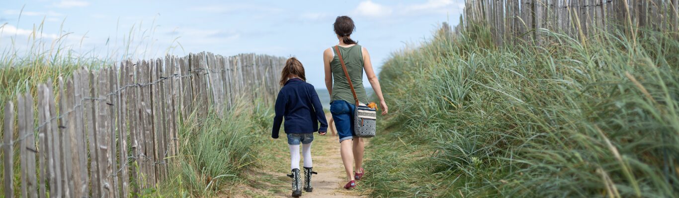 A family spending the day on the shoreline